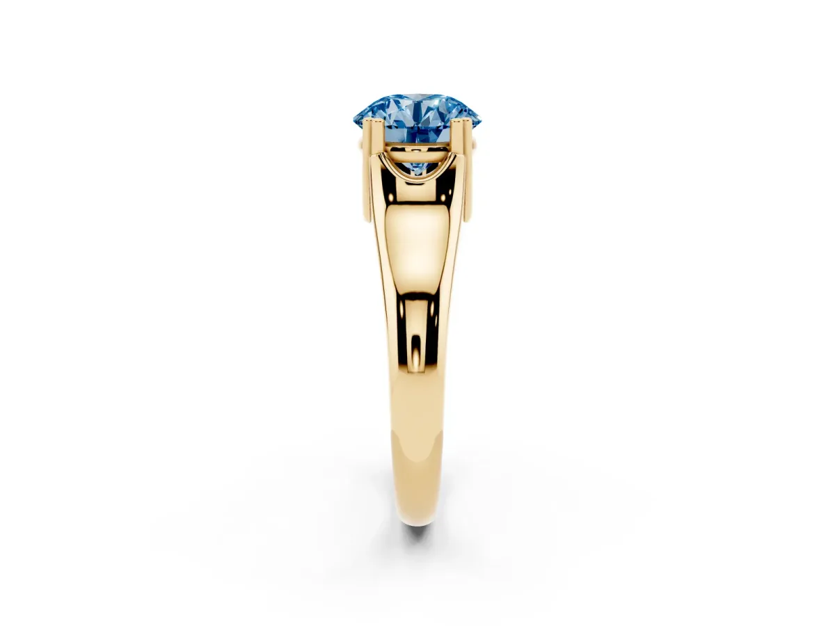 Fancy Blue Round Cut Diamond Solitaire Ring with Wide Band and Prong Setting Yellow gold