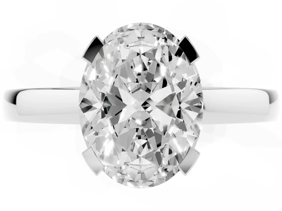 Oval Cut Cut Solitaire Ring with Four-Prong Setting and Classic Band Silver