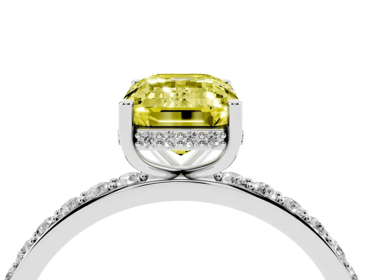 Fancy Yellow Emerald Cut Diamond Solitaire Ring with Pavé Band and Hidden Halo White gold