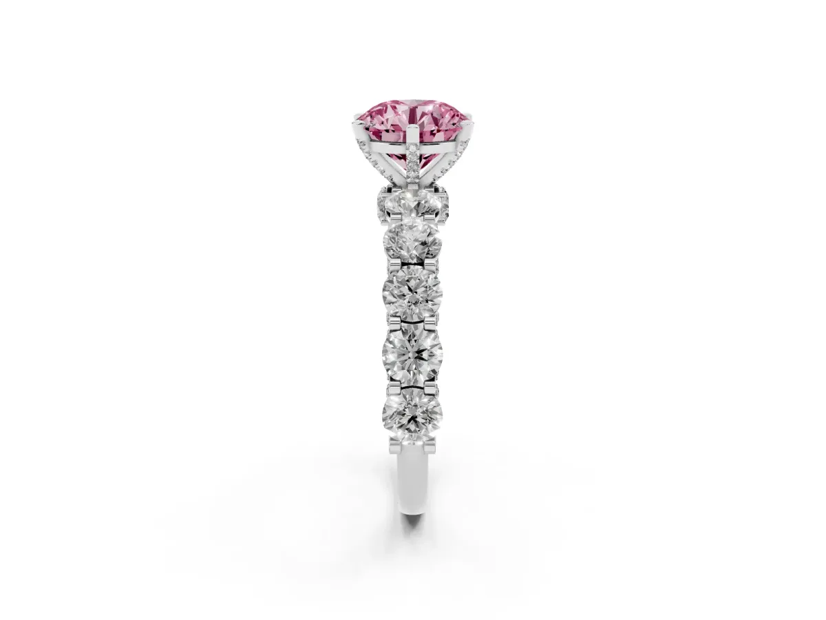 Fancy Pink Round Cut Diamond Side Stone Engagement Ring with Four-Prong Setting Silver