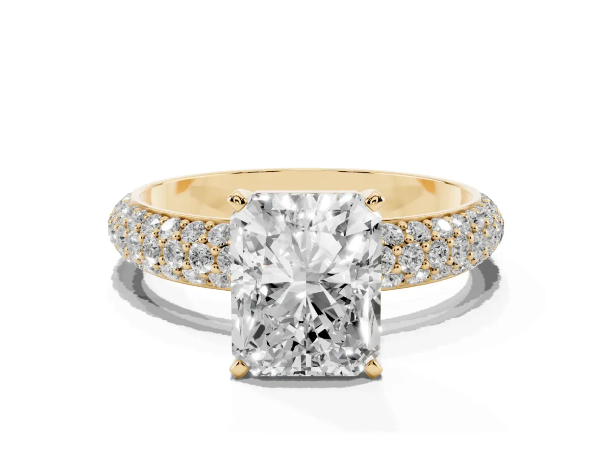 Radiant Cut Diamond Solitaire Ring with Prong Setting and Pavé Band Yellow gold