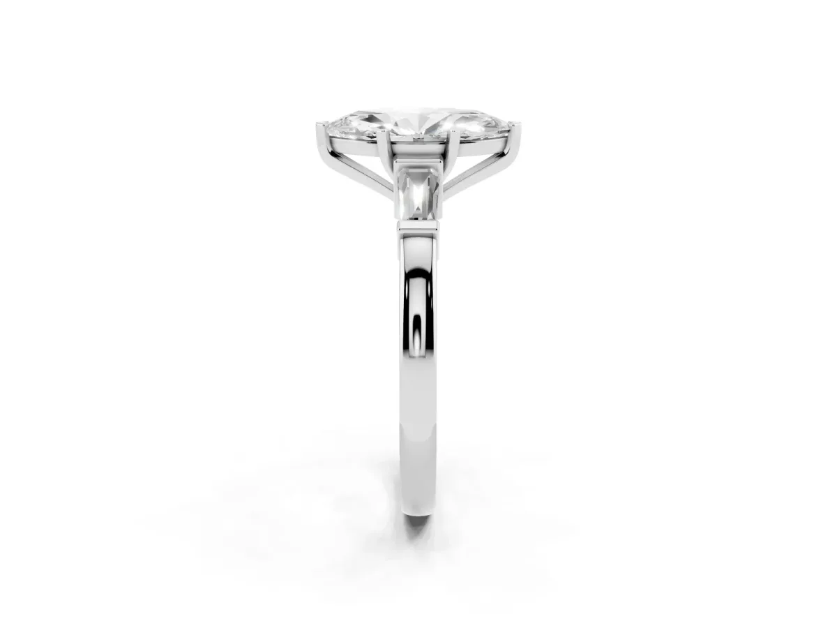 Marquise Cut Cut Diamond Solitaire Ring with Tapered Baguette Accents and Four-Prong Setting Platinum