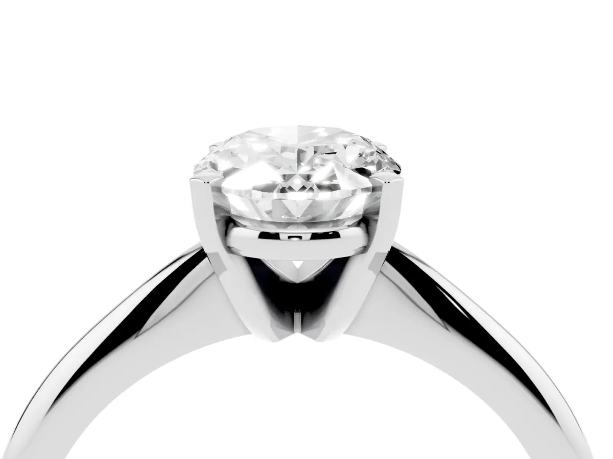 Oval Cut Cut Solitaire Ring with Four-Prong Setting on a Classic Band Platinum