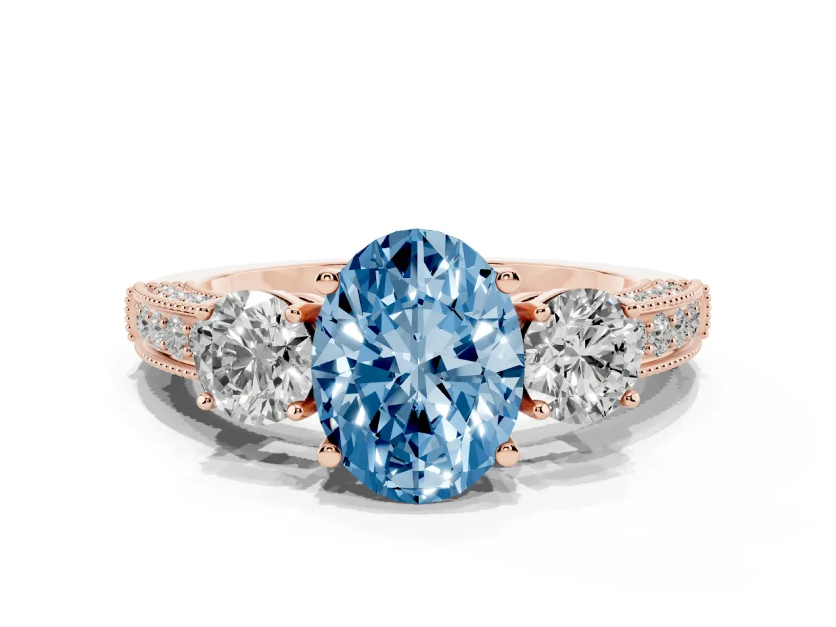 Fancy Blue Oval Cut Three-Stone Diamond Ring with Pavé Band and Four-Prong Setting Rose gold