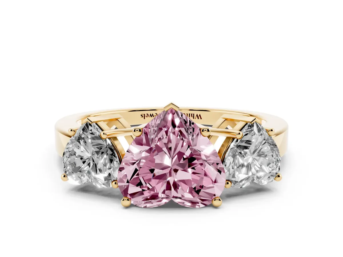 Fancy Pink Three-Stone Heart Cut Cut Diamond Engagement Ring with Flat Band and Four-Prong Setting Yellow gold