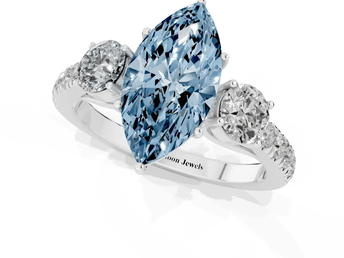 Fancy Blue Marquise Cut Cut Diamond Three-Stone Ring with Round Side Stones and Pavé Band Silver