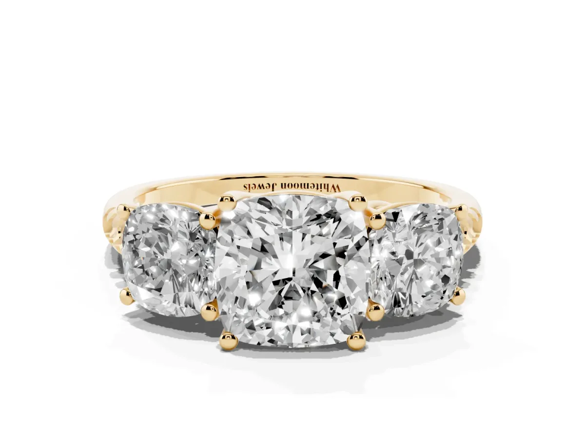 Three-Stone Cushion Cut Diamond Ring with Round Pavé Band and Prong Setting Yellow gold