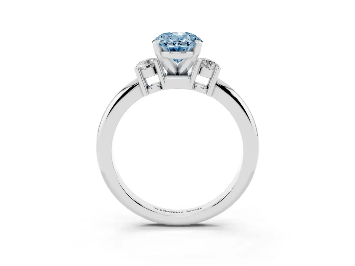 Fancy Blue Three-Stone Oval Cut Cut Diamond Solitaire with Prong Setting and Classic Band Platinum