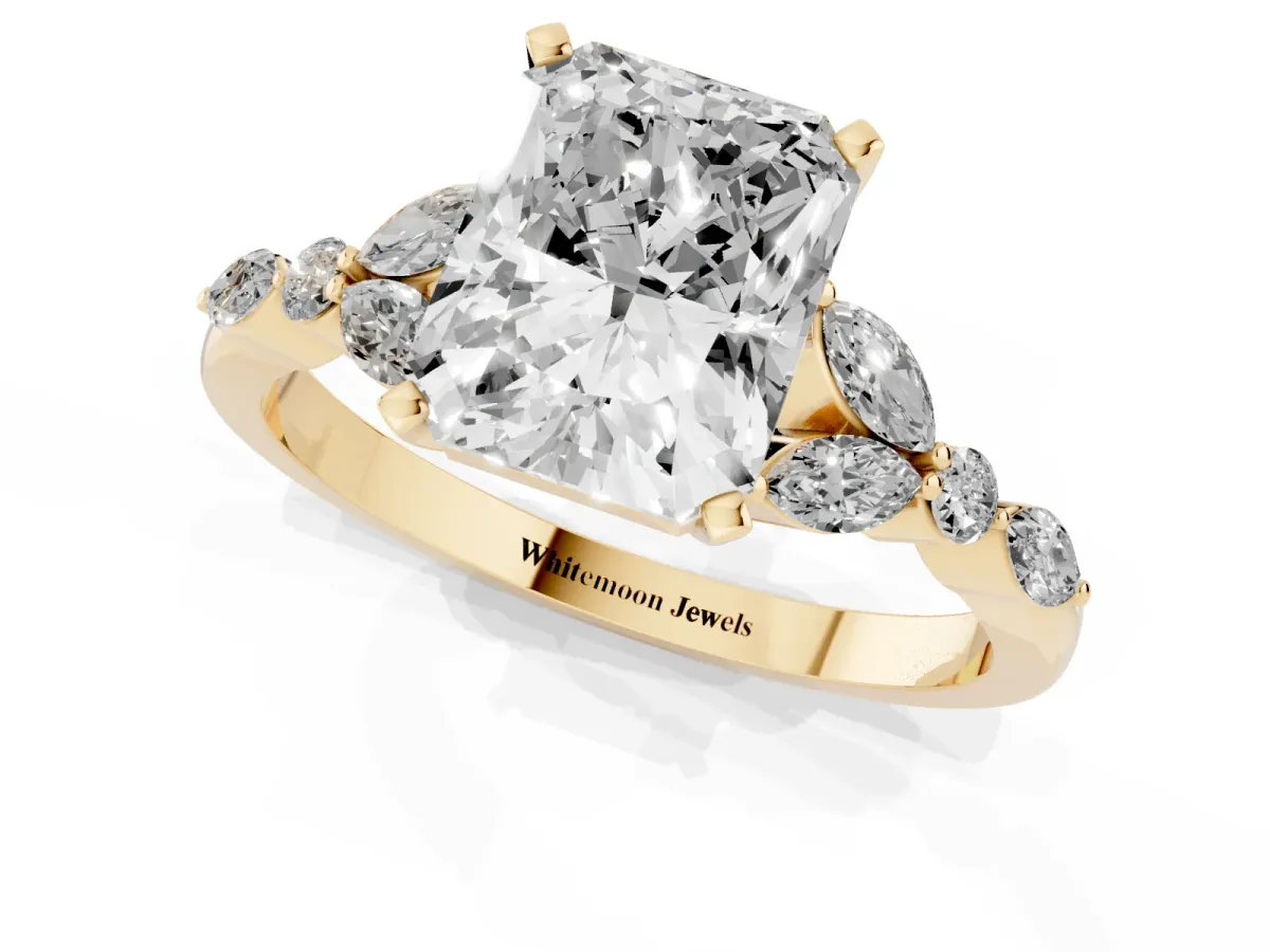 Radiant Cut Diamond Solitaire Ring with Side Stones and Four-Prong Setting Yellow gold