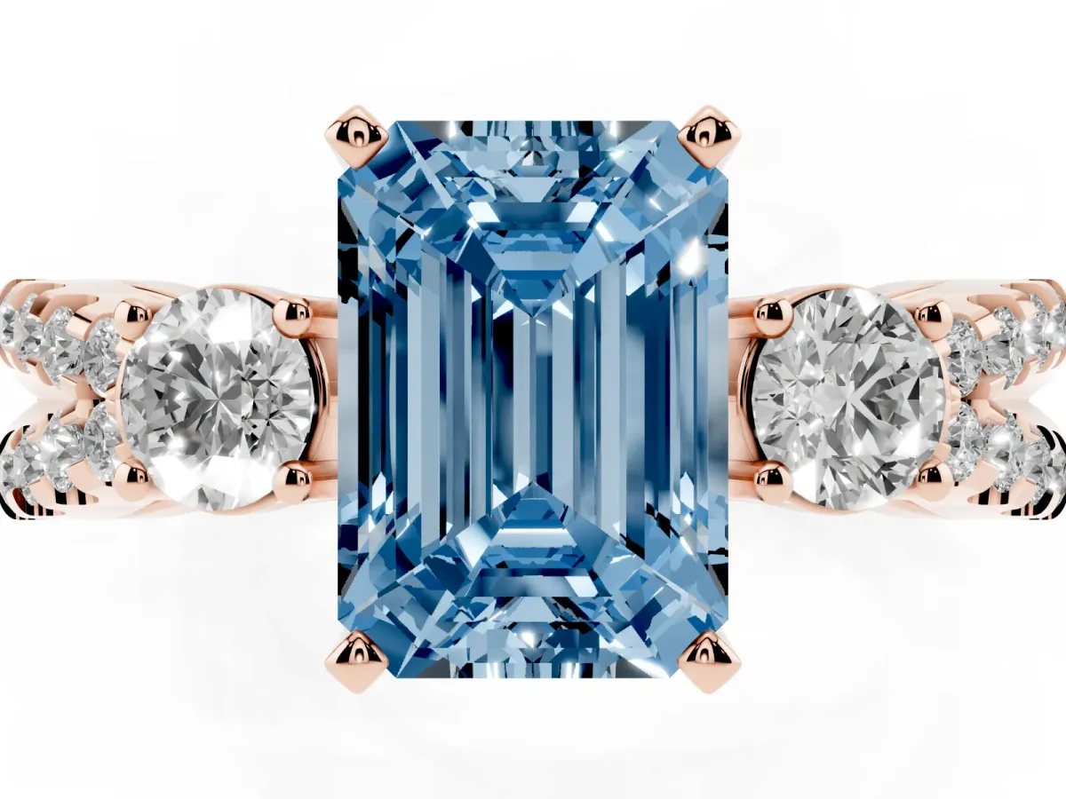 Fancy Blue Emerald Cut Diamond Three-Stone Ring with Pavé Split Shank and Four-Prong Setting Rose gold