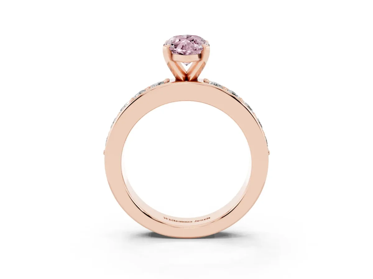 Fancy Pink Marquise Cut Diamond Engagement Ring with Channel Set Round Band and Prong Setting Rose gold