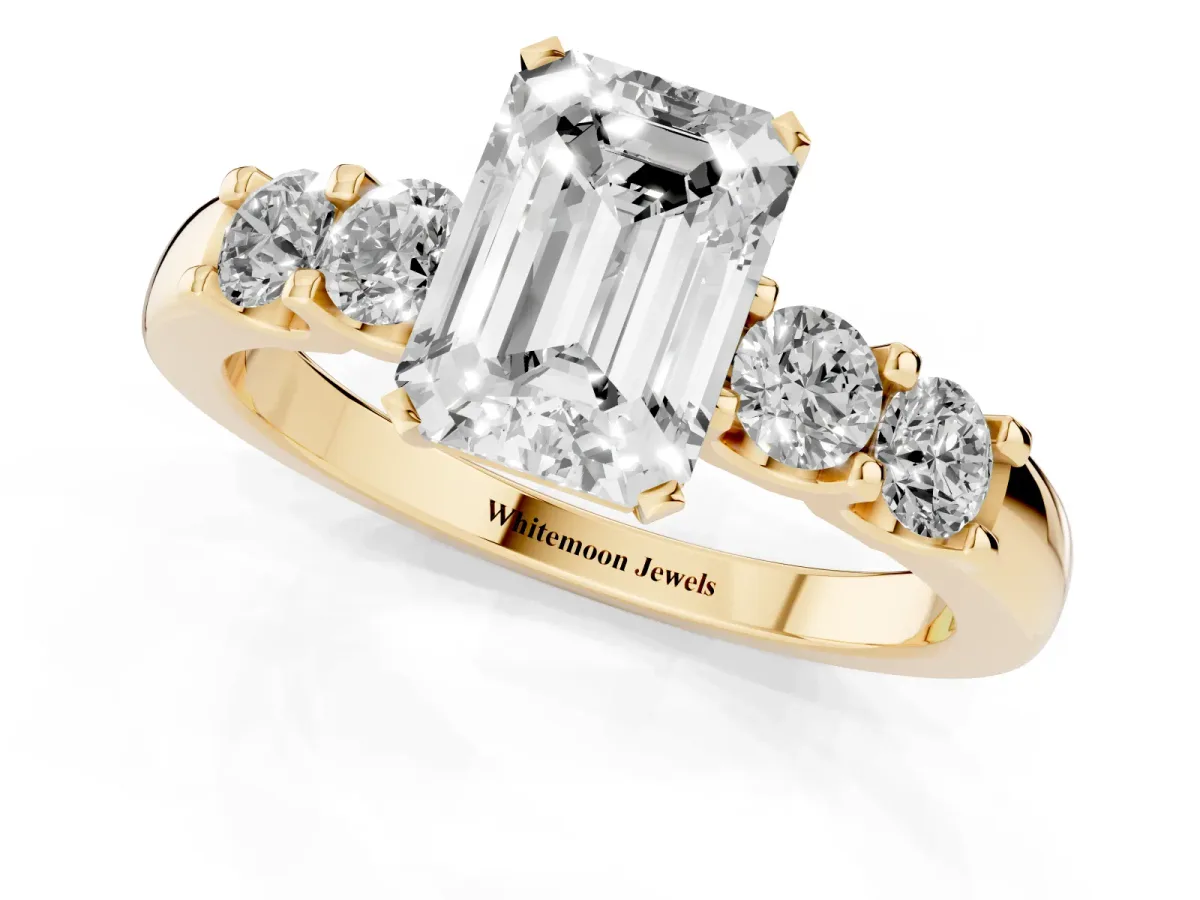 Emerald Cut Brilliant Cut Diamond Five-Stone Prong Set Engagement Ring with Channel Band Yellow gold