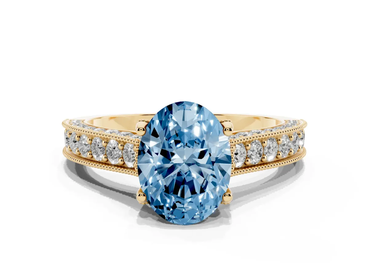 Fancy Blue Oval Cut Cut Diamond Solitaire Ring with Milgrain Pave Band and Four Prong Setting Yellow gold