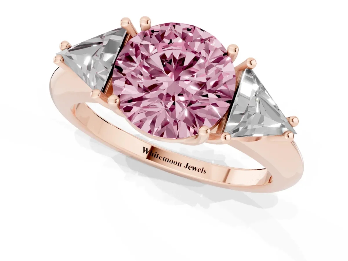 Fancy Pink Three-Stone Round Cut Diamond Engagement Ring with Trillion Side Stones and Prong Setting Rose gold