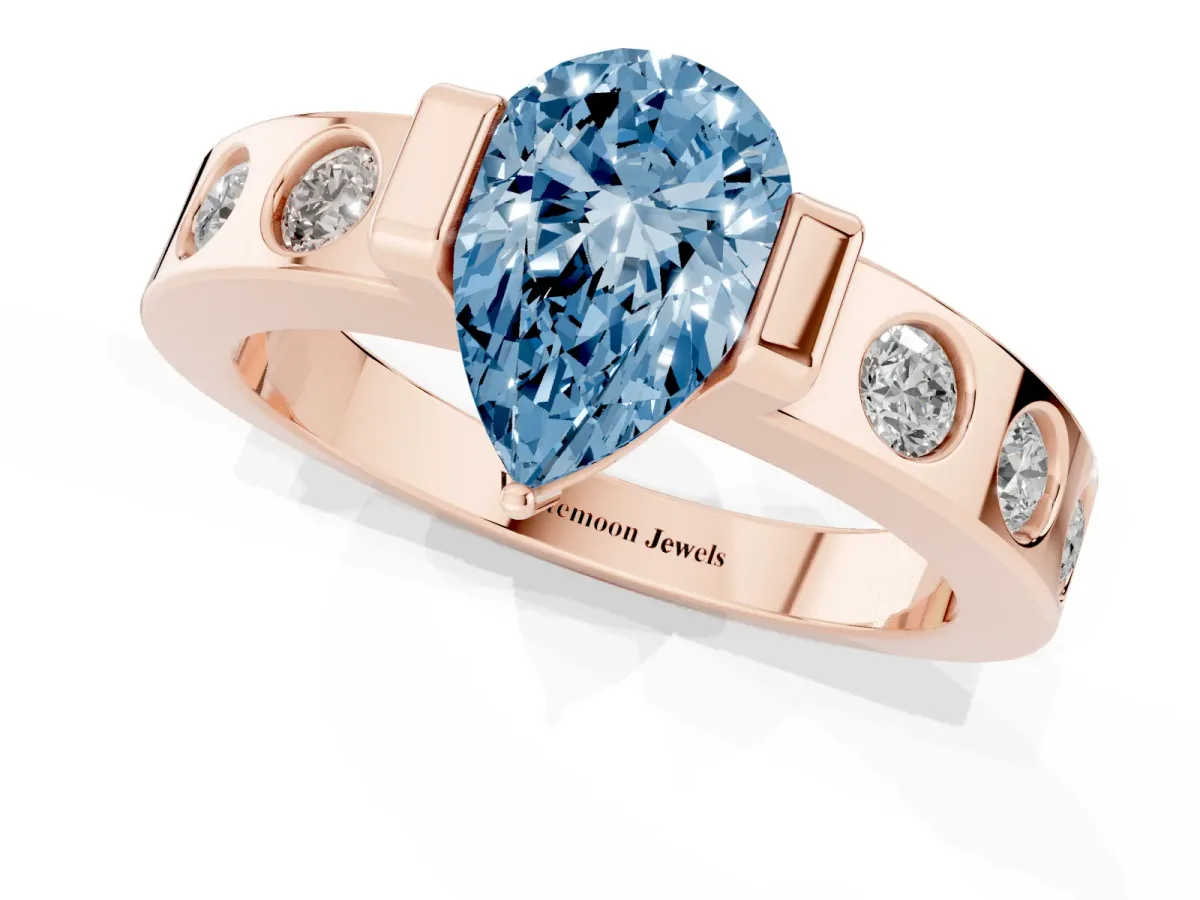 Fancy Blue Pear Cut Brilliant Channel-Set Diamond Ring with Bezel Prong Setting Rose gold