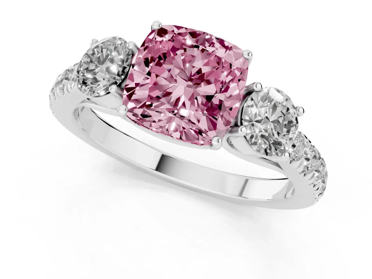 Fancy Pink Cushion Cut Cut Diamond Three-Stone Ring with Round Side Stones and Pavé Band Platinum