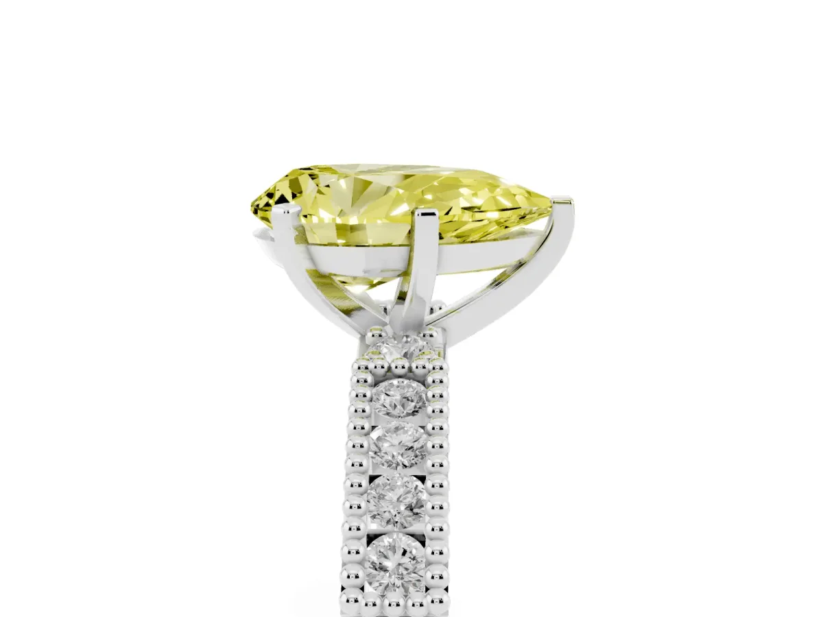 Fancy Yellow Pear Cut Solitaire with Pavé Band and Four-Prong Setting Platinum