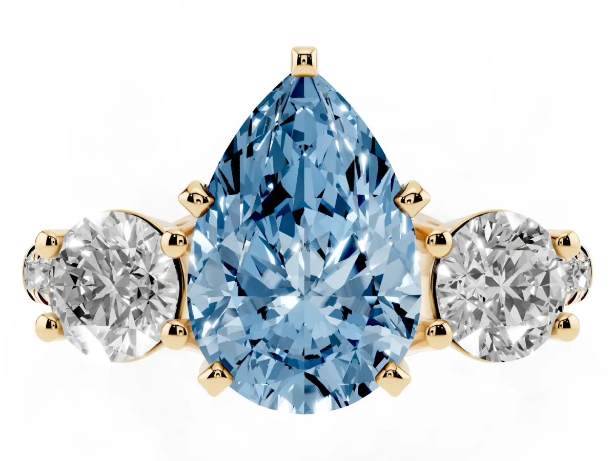 Fancy Blue Three-Stone Pear Cut Diamond Pavé Band with Four-Prong Setting Yellow gold
