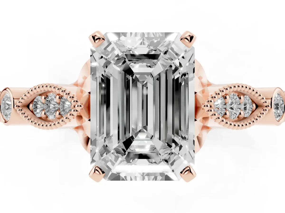 Emerald Cut Cut Diamond with Milgrain Marquise and Bezel Accents on a Solitaire Band with Prong Setting Rose gold