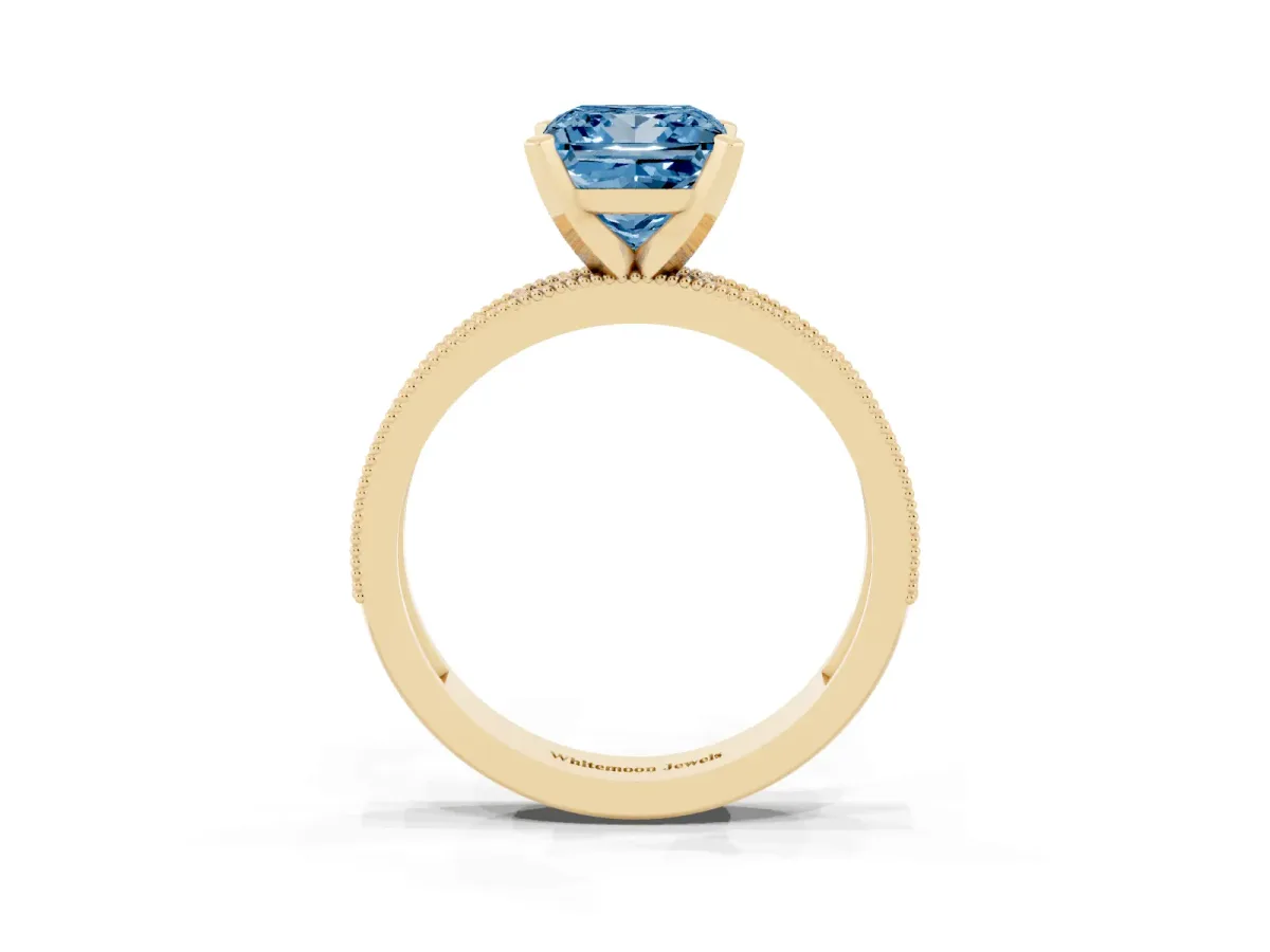 Fancy Blue Princess Cut Diamond Milgrain Pavé Engagement Ring with Four-Prong Setting Yellow gold