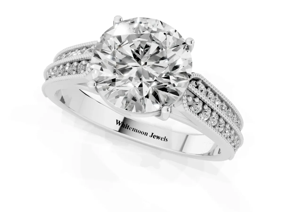 Round Cut Cut Pave Split Shank Engagement Ring with Four-Prong Setting Platinum