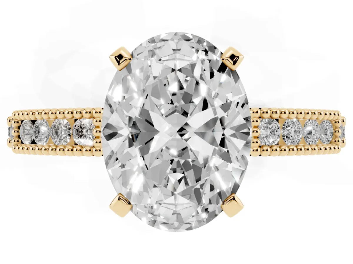 Oval Cut Solitaire with Pavé Band and Four-Prong Setting Yellow gold