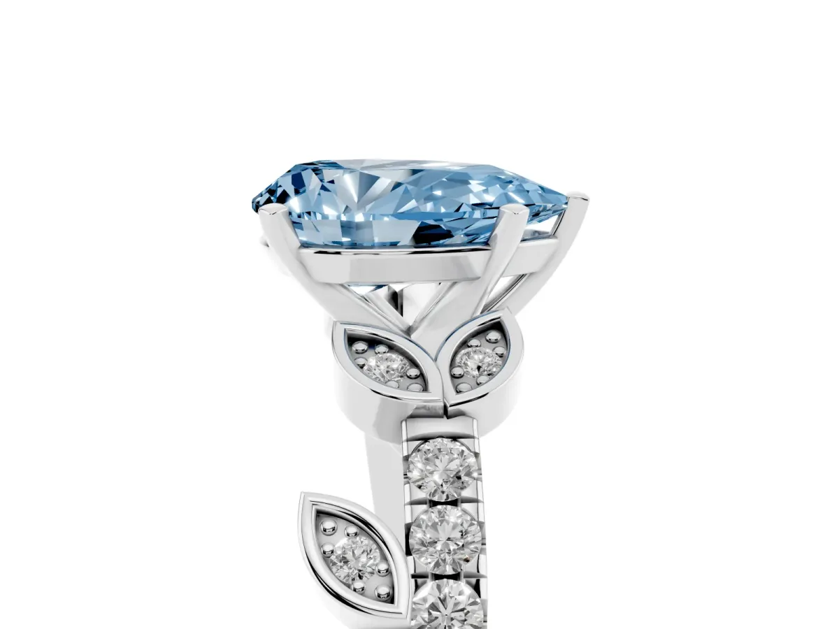 Fancy Blue Pear Cut Solitaire Leaf-Inspired Diamond Ring with Pavé Band and Four-Prong Setting Silver