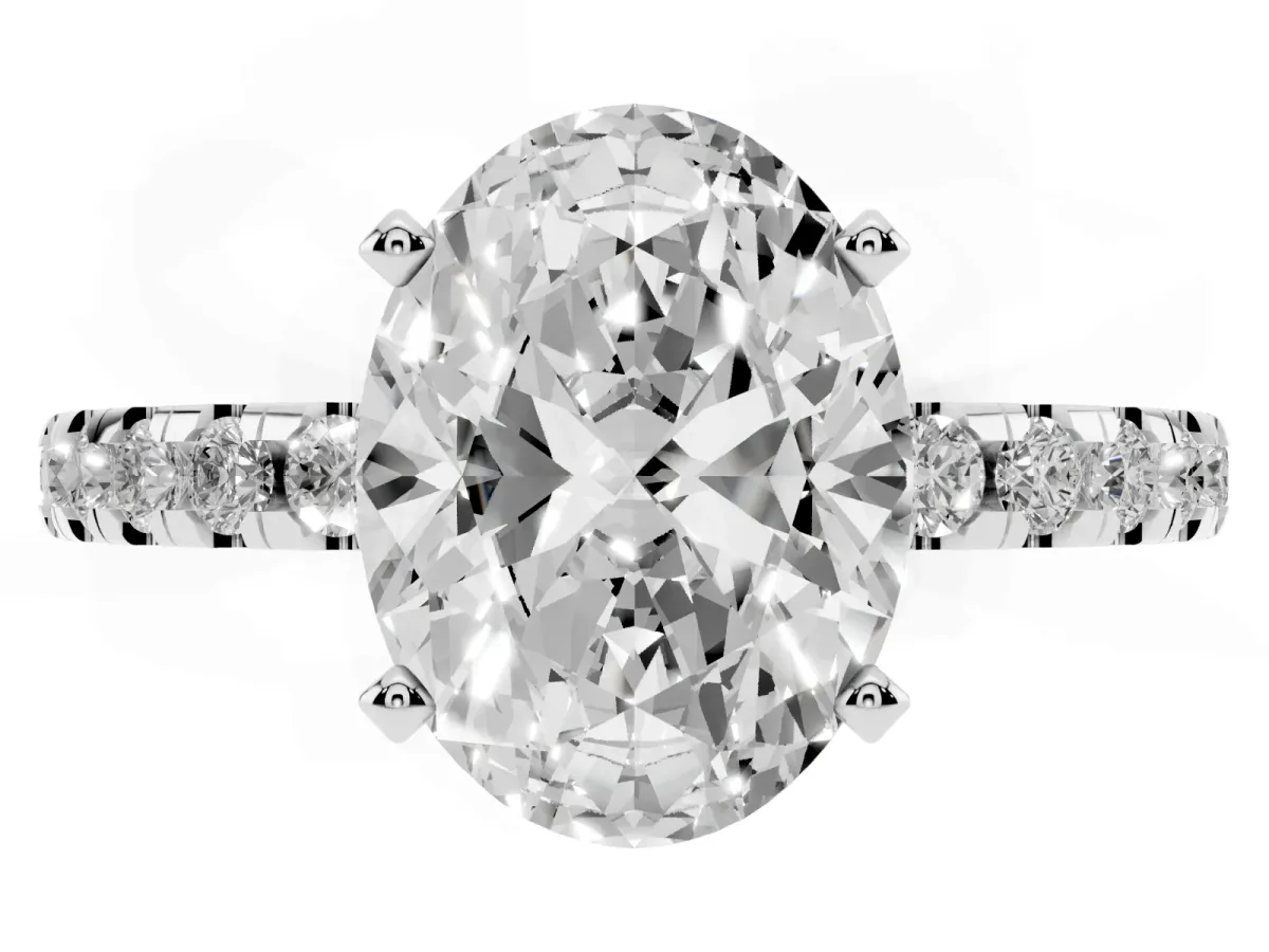 Oval Cut Diamond Solitaire Ring with Round Pavé Band and Four-Prong Setting Silver