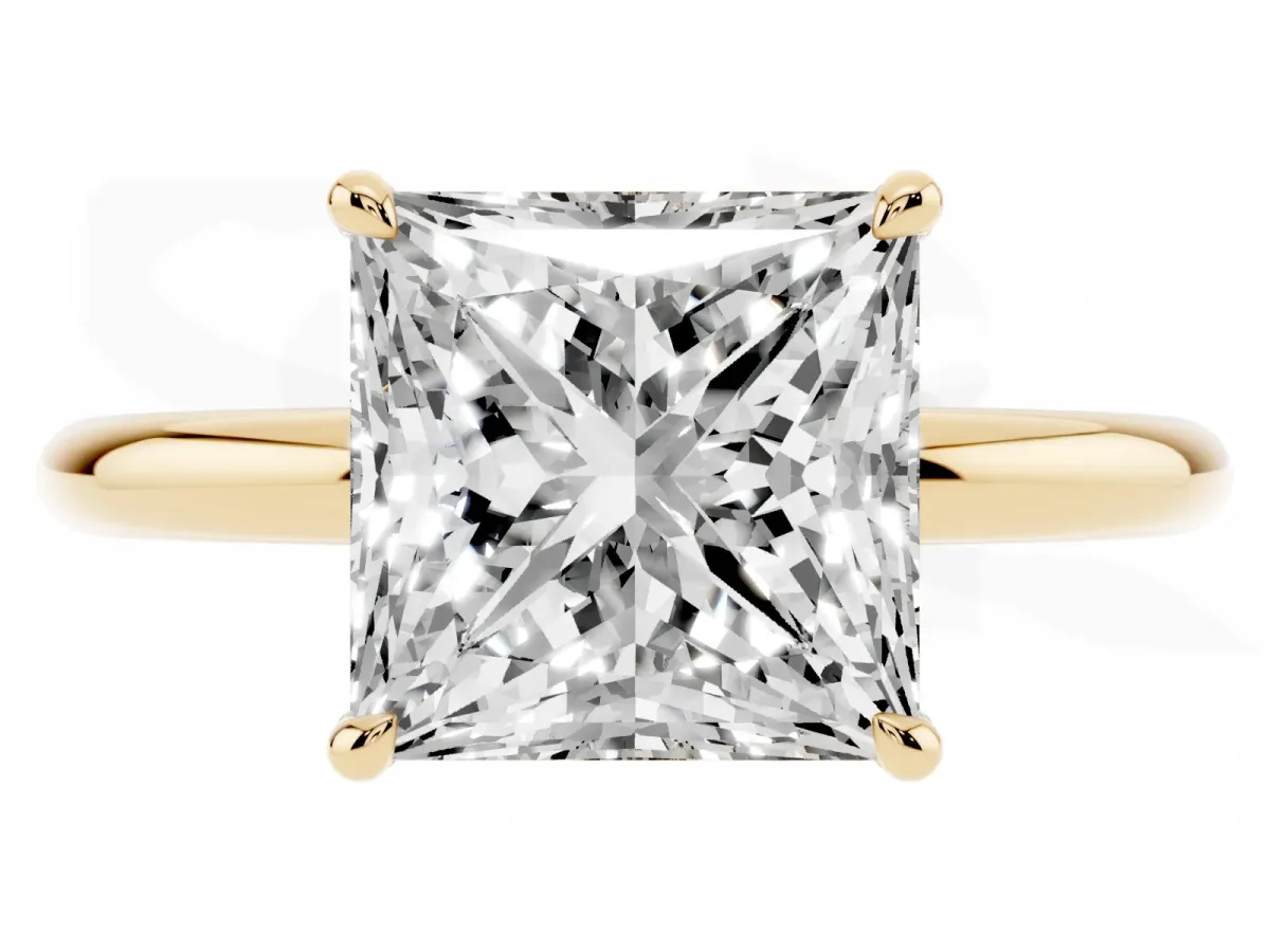 Princess Cut Diamond Solitaire Ring with Thin Band and Four-Prong Setting Yellow gold