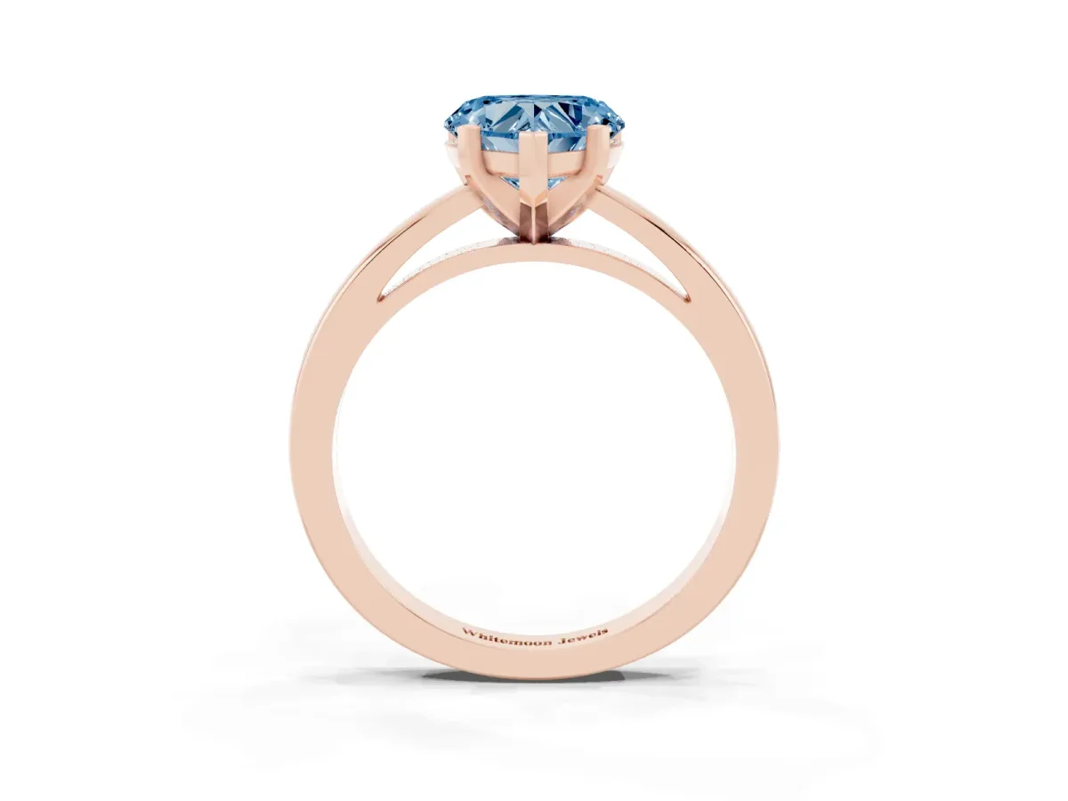 Fancy Blue Heart Cut Solitaire Diamond Engagement Ring with Four-Prong Setting on a Classic Band Rose gold