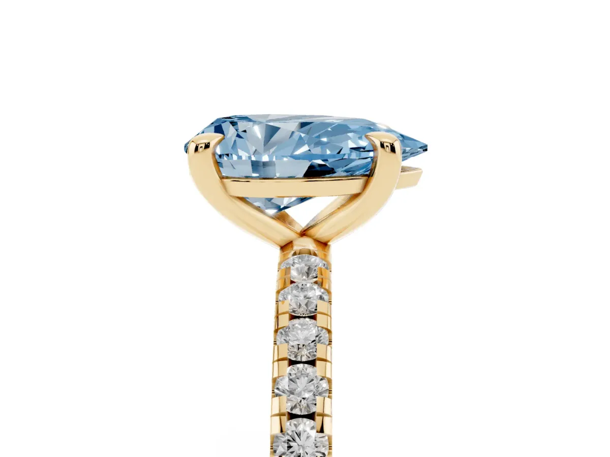 Fancy Blue Pear Cut Diamond Brilliant Solitaire Ring with Pavé Band and Four-Prong Setting Yellow gold