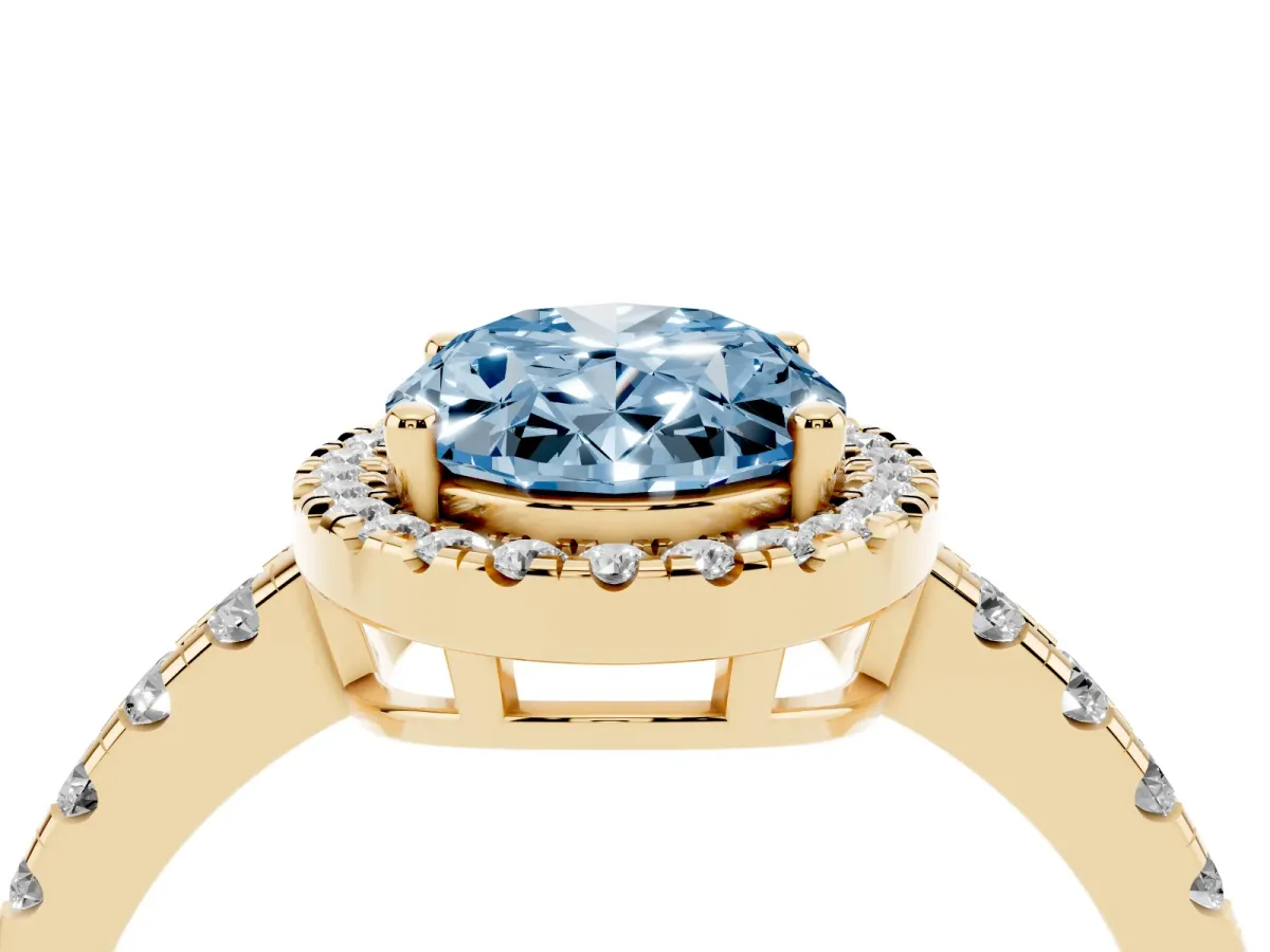 Fancy Blue Oval Cut Diamond Halo Ring with Pavé Band and Four-Prong Setting Yellow gold