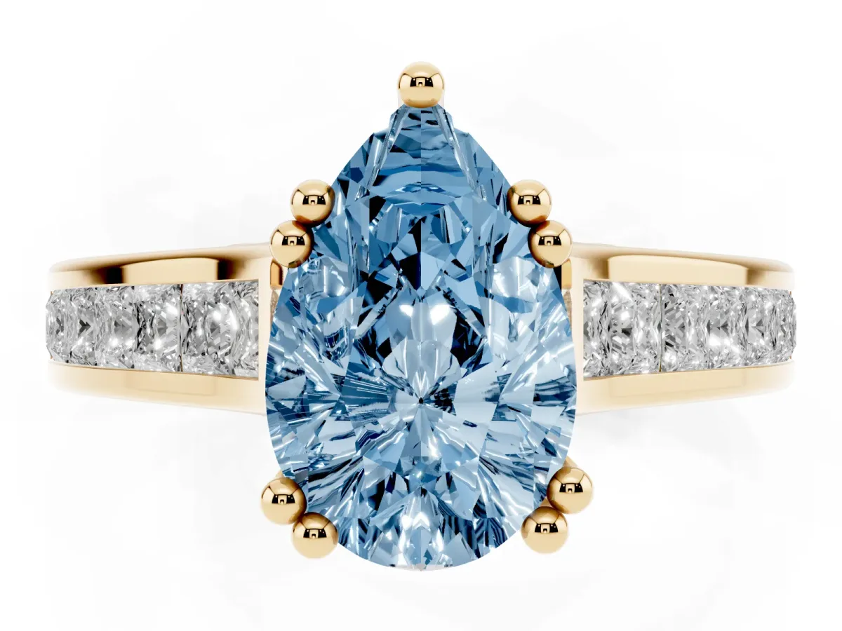 Fancy Blue Pear Cut Cut Channel Set Solitaire Engagement Ring with Prong Setting Yellow gold