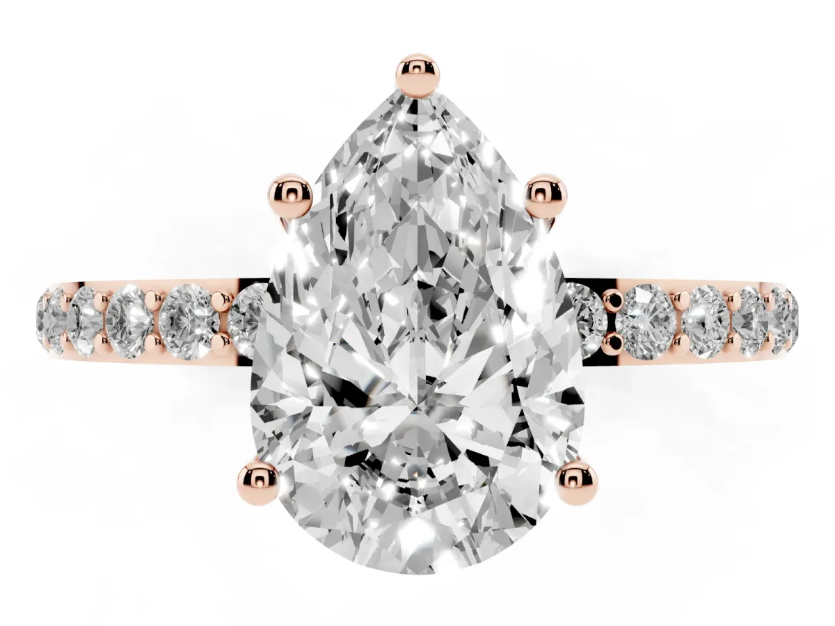 Pear Cut Diamond Solitaire Ring with Round Pavé Shoulders and Prong Setting Rose gold