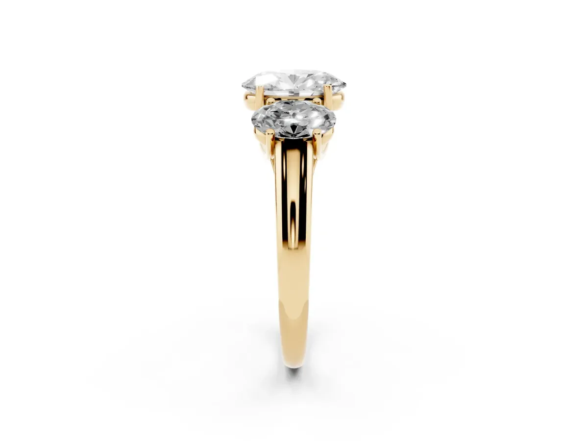 Three-Stone Oval Cut Diamond Engagement Ring with Prong Setting Yellow gold