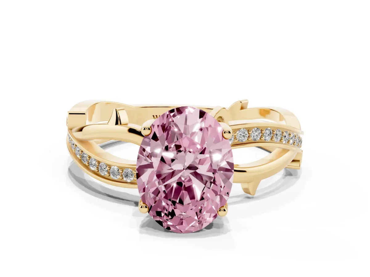 Fancy Pink Oval Cut Solitaire Twist Band with Pavé Accents and Four-Prong Setting Yellow gold