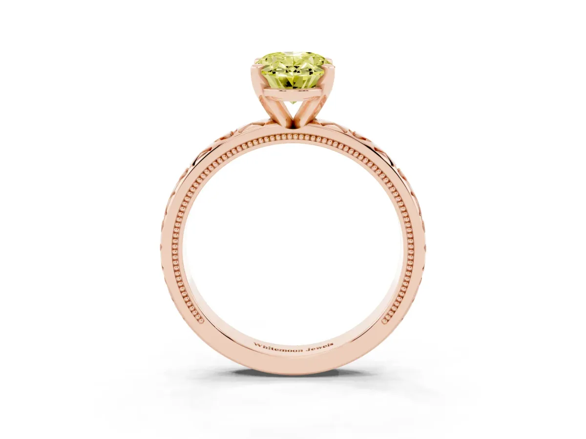 Fancy Yellow Oval Cut Solitaire Diamond Engagement Ring with XO Engraved Band and Four-Prong Setting Rose gold