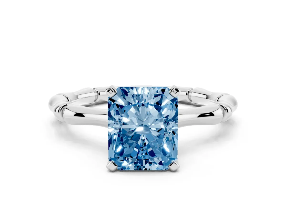 Fancy Blue Radiant Cut Solitaire Diamond Ring with Bamboo Band and Four-Prong Setting Silver