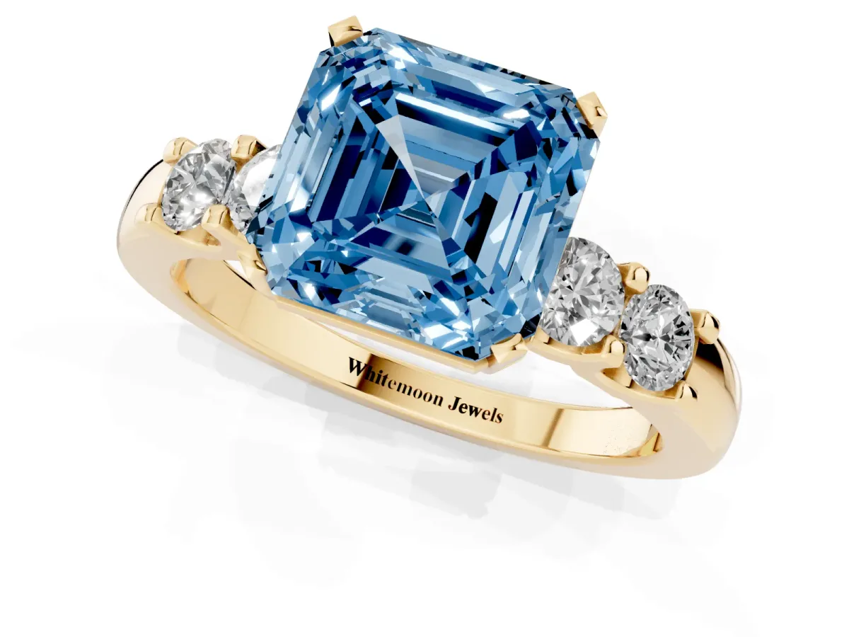 Fancy Blue Asscher Cut Brilliant Cut Diamond Five-Stone Prong Set Engagement Ring with Channel Band Yellow gold