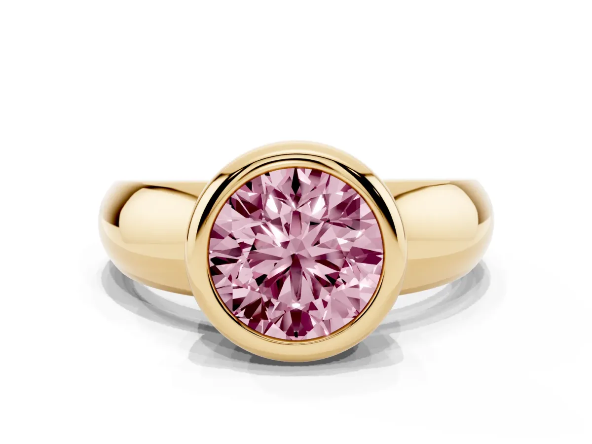 Fancy Pink Bezel Set Round Cut Solitaire Ring with Wide Band Yellow gold