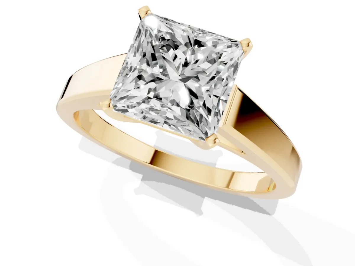 Princess Cut Solitaire Engagement Ring with Four-Prong Setting and Tapered Band Yellow gold