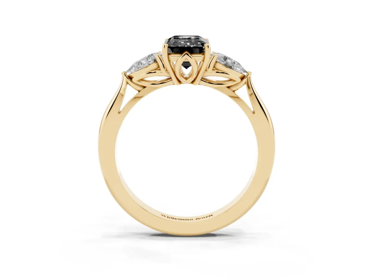Fancy Black Emerald Cut Diamond Three-Stone Ring with Pear Side Stones and Prong Setting Yellow gold