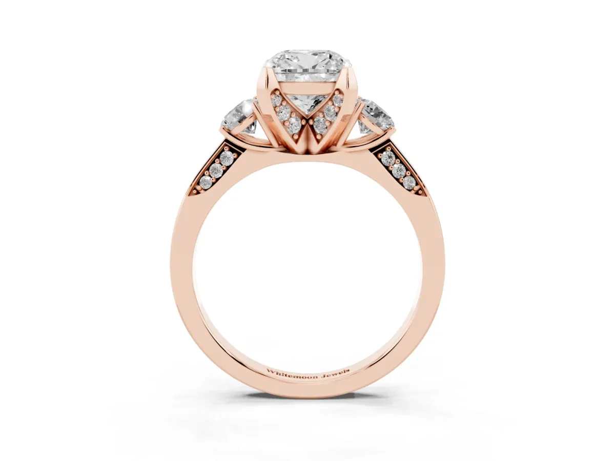 Cushion Cut Brilliant Three-Stone Diamond Ring with Pavé Band and Four-Prong Setting Rose gold