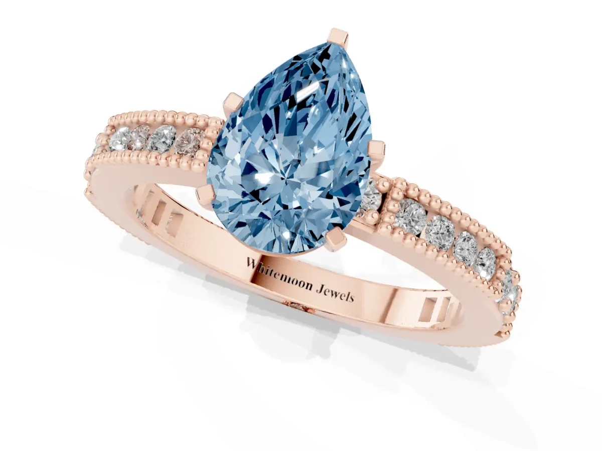 Fancy Blue Pear Cut Solitaire with Pavé Band and Four-Prong Setting Rose gold