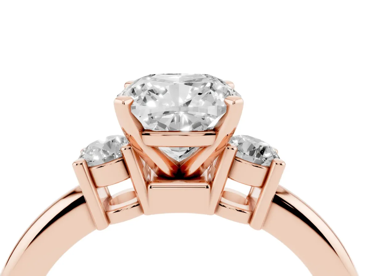 Three-Stone Cushion Cut Cut Diamond Solitaire with Prong Setting and Classic Band Rose gold
