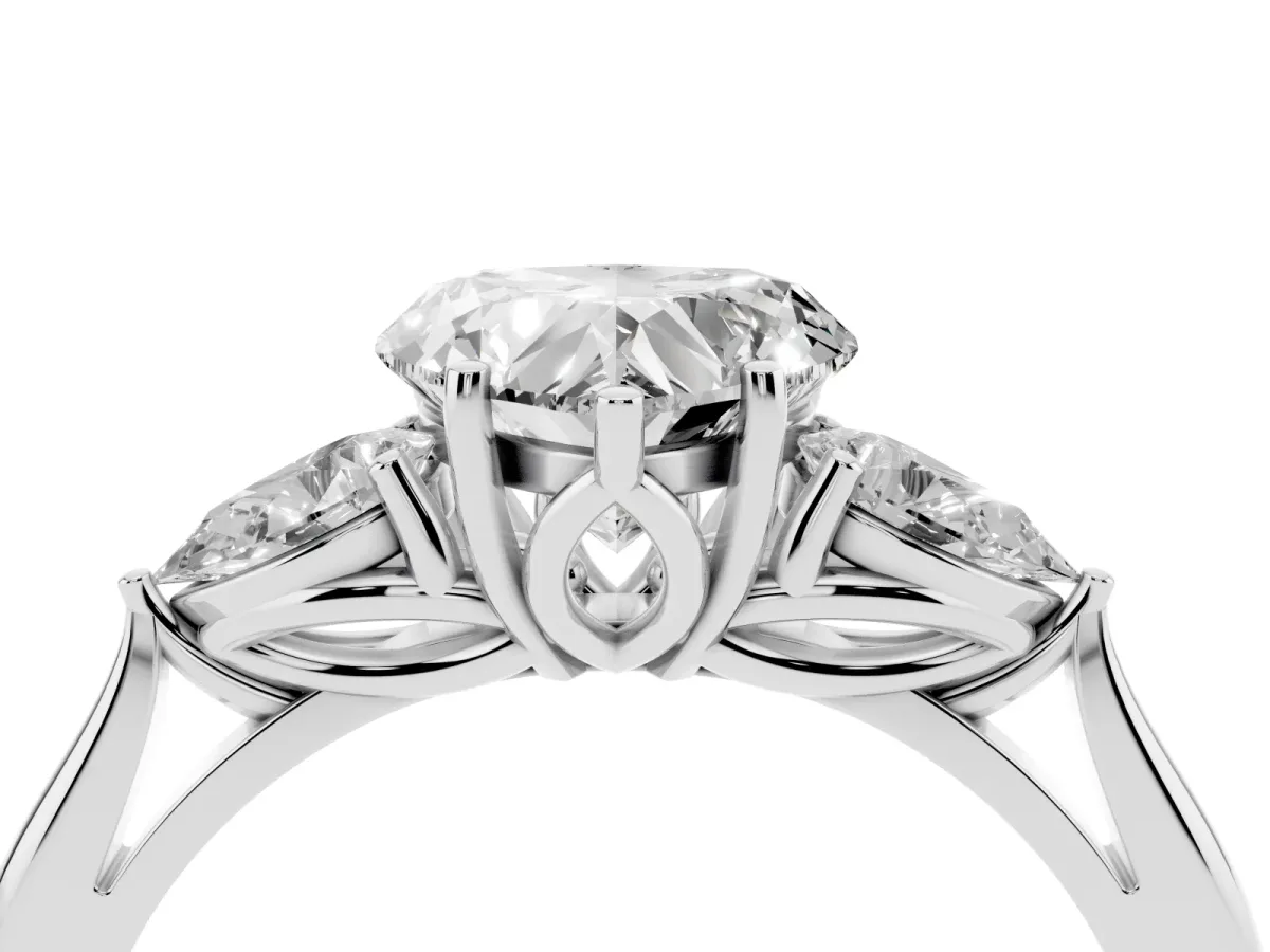 Three-Stone Heart Cut Diamond Ring with Pear Side Stones in Four-Prong Setting Silver