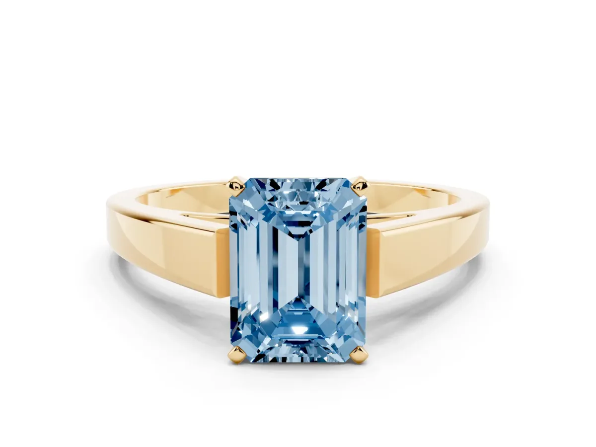 Fancy Blue Emerald Cut Solitaire Engagement Ring with Four-Prong Setting and Tapered Band Yellow gold