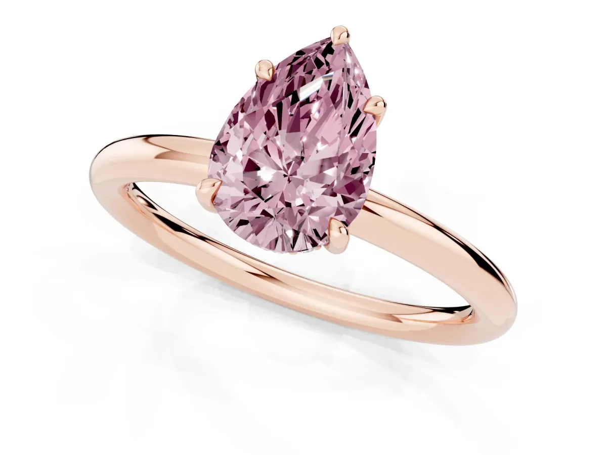 Fancy Pink Pear Cut Diamond Solitaire Ring with Thin Band and Four-Prong Setting Rose gold
