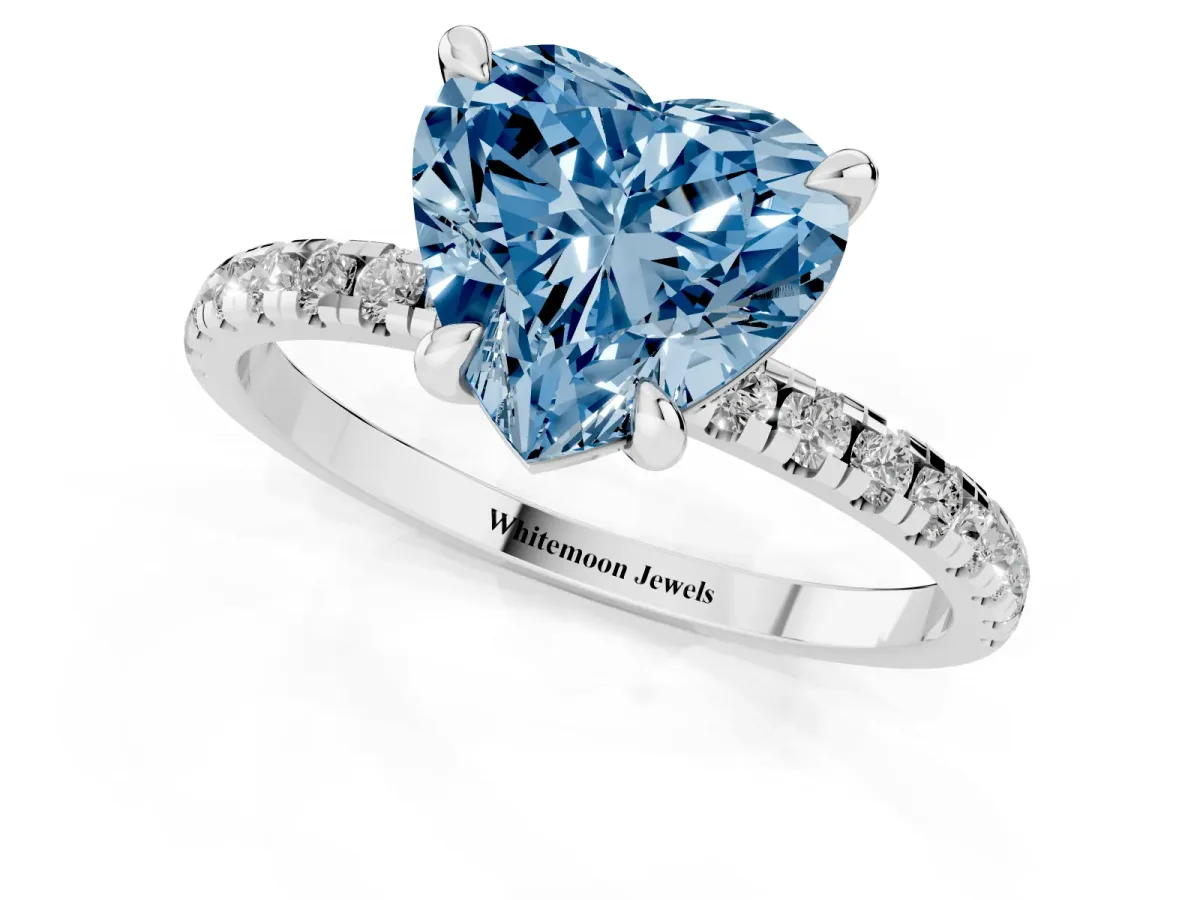 Fancy Blue Heart Cut Diamond Brilliant Solitaire Ring with Pavé Band and Four-Prong Setting Platinum