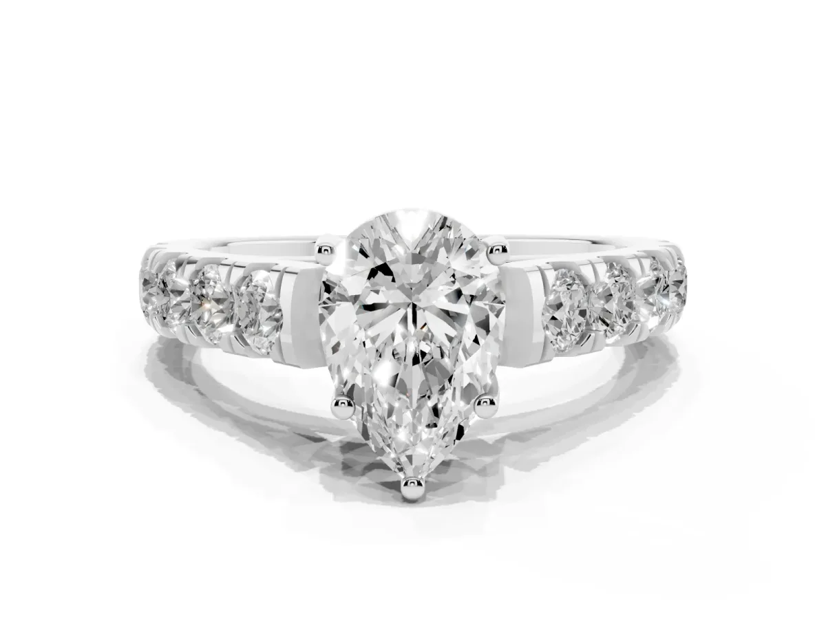 Pear Cut Cut Diamond Solitaire Ring with Micro Pave Band and Prong Setting Platinum